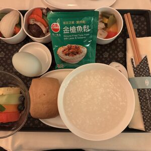 Morning breakfast: porridge, salted eggs, brown sugar steamed bun